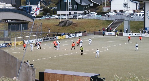 B36 Tórshavn playing Skála in Gundadalur Stadium. B36 in white - Skála in orange. Action here: B36 almost scoring after a free kick.