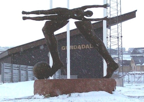 Hans Pauli Olsen's sculpture outside the gate at Gundadalur Stadium