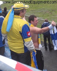 Ukranian supporter stripped to the waist, celebrating his country's victory - yvirkroppaball